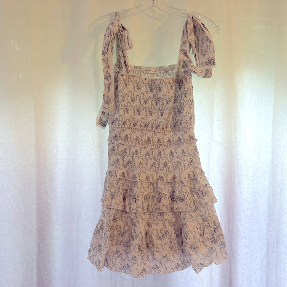 Pretty, whimsical summer dress. Tiers. Ruched. Tie straps with lace detail.